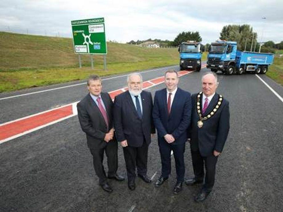 Conor Loughrey TransportNI, Francie Molloy (MP), Minister Hazzard and Chair of Mid-Ulster Council Trevor Wilson.