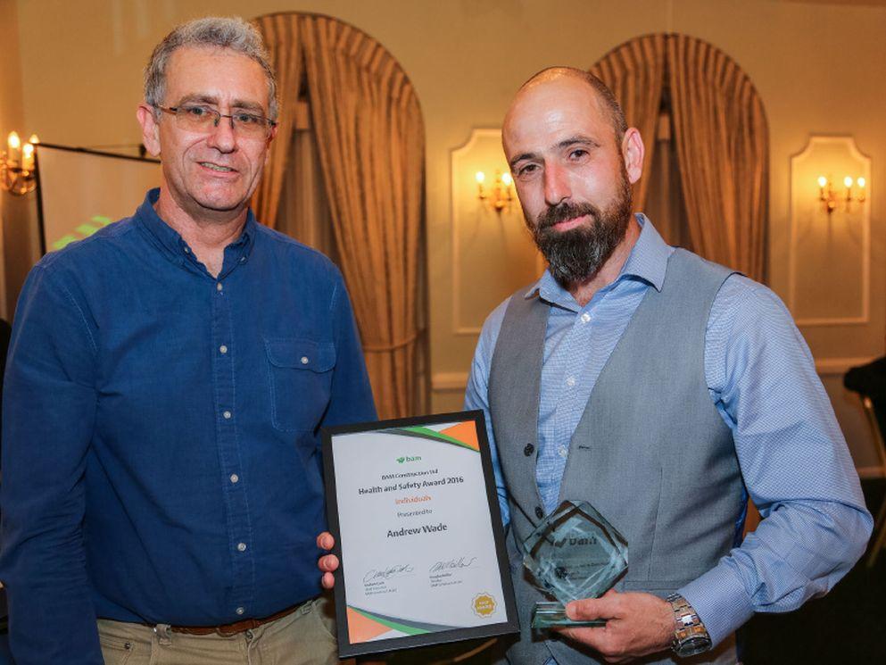 Mark Lockwood (left) presents Andrew Wade (right) with his health and safety award