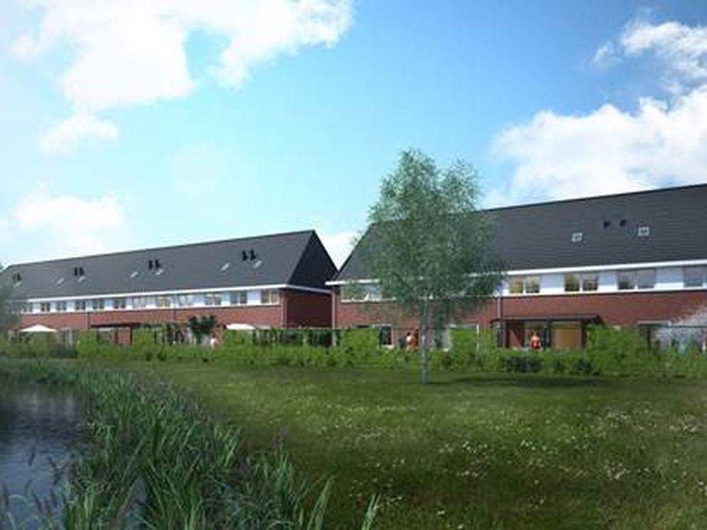 AM geeft startsein bouw woningen Tuinveld ’s-Gravenzande; wethouder Duijvestijn verricht officiële handeling