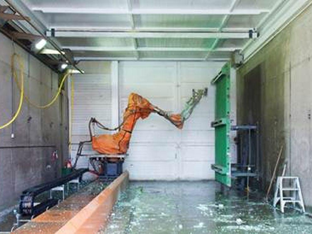 Robot voor reiniging bekistingpanelen