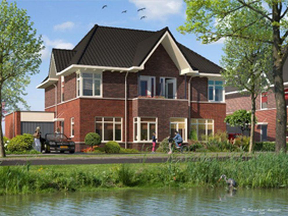 Wethouder Siebenga geeft startsein bouw woningen De Fok in Heerenveen