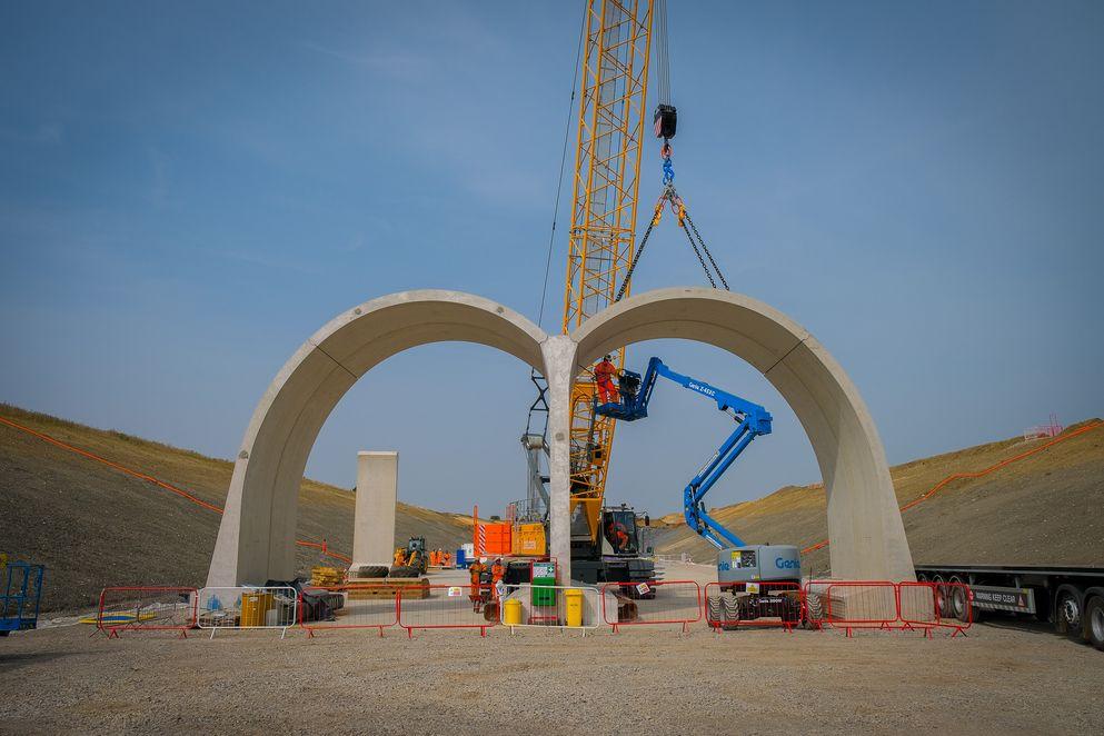 Engineers at work on the first arch