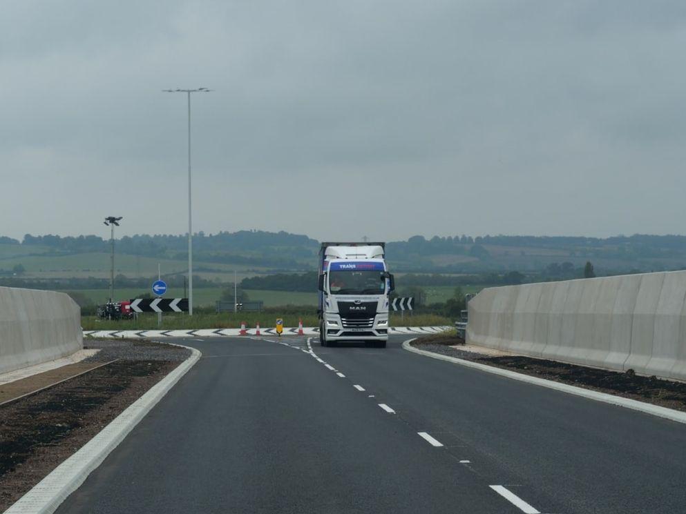 Vehicle driving over the newly opened A41 bridge near Waddesdon