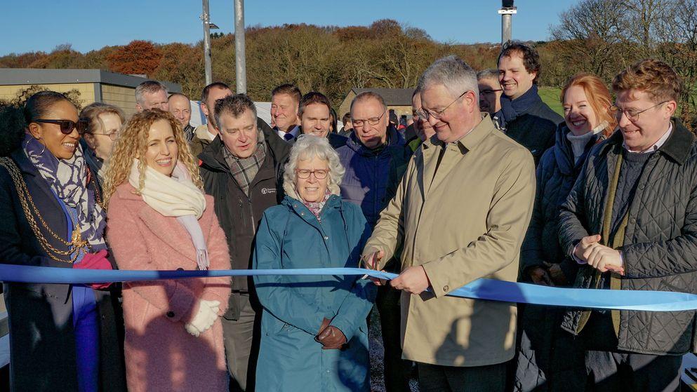 Event with ribbon being cut