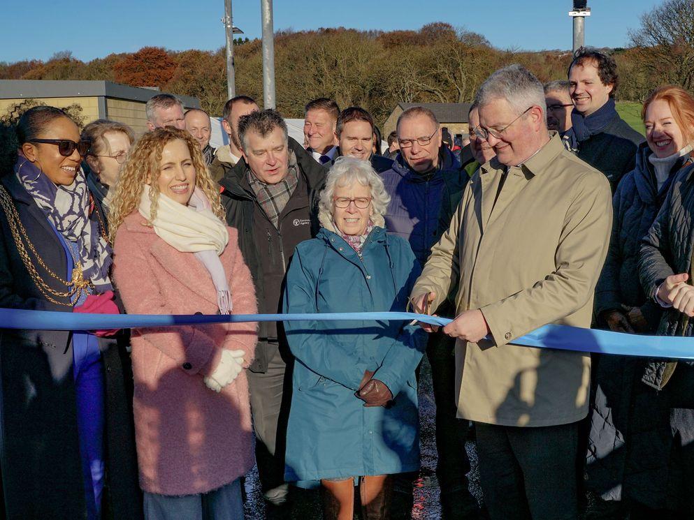 Event with ribbon being cut